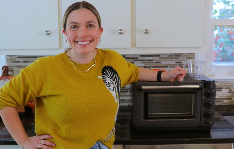 https://foodboxhq.com/wp-content/uploads/2021/04/Emily-With-Our-Tovala-Smart-Oven-Pro.webp