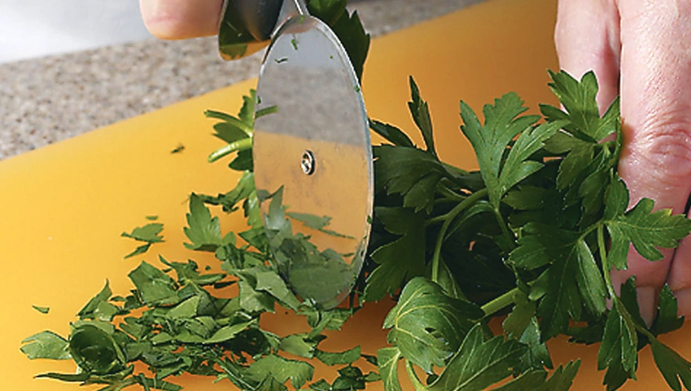 Cutting Herbs With Pizza Cutter