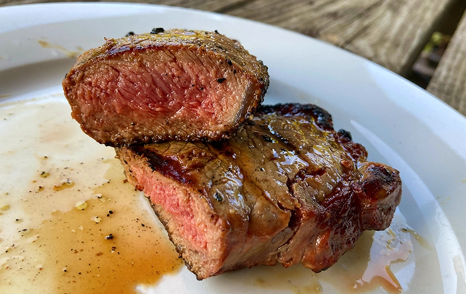 https://foodboxhq.com/wp-content/uploads/2023/10/ButcherBox-Grass-fed-Beef-Strip-Loin-Steak-Cooked.webp